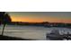 Beautiful waterfront view featuring a tranquil river and picturesque sunset, enhancing the home's serene appeal at 63 Mariners Cay, Folly Beach, SC 29439