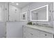 Modern bathroom with glass shower, granite countertop vanity, and LED lighted mirror at 7239 Commodore Rd, Hollywood, SC 29449