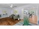 Open-concept living area showcasing seamless flow to the kitchen and dining area, perfect for entertaining at 7239 Commodore Rd, Hollywood, SC 29449