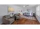 Elegant living room featuring hardwood floors, comfortable seating, and stylish decor at 7239 Commodore Rd, Hollywood, SC 29449