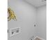 Unfinished utility room with essential connections and a blank canvas, ready to be personalized at 7239 Commodore Rd, Hollywood, SC 29449