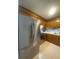 Spacious kitchen features stainless steel refrigerator, gas range and oven and tile flooring at 8254 Timberidge Ct, North Charleston, SC 29420