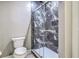 Bathroom featuring tiled shower with glass enclosure and toilet at 1025 Riverland Woods Pl # 904, Charleston, SC 29412