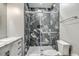 Bathroom featuring tiled shower with glass enclosure and vanity at 1025 Riverland Woods Pl # 904, Charleston, SC 29412