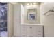 Bathroom featuring tiled shower with glass enclosure, vanity, and large drawers at 1025 Riverland Woods Pl # 904, Charleston, SC 29412