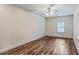 Bright bedroom with hard wood floors, ceiling fan, and natural light at 1025 Riverland Woods Pl # 904, Charleston, SC 29412