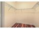 Walk-in closet with wire shelving and hardwood floors offers maximum storage at 1025 Riverland Woods Pl # 904, Charleston, SC 29412