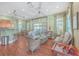 Inviting clubhouse interior with wicker furniture and a bar area for entertaining guests at 1025 Riverland Woods Pl # 904, Charleston, SC 29412