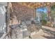 Outdoor grill station with stone accents, providing a perfect space for barbecues at 1025 Riverland Woods Pl # 904, Charleston, SC 29412
