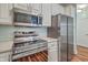 Kitchen boasting stainless steel appliances and stylish range at 1025 Riverland Woods Pl # 904, Charleston, SC 29412