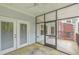 Screened in porch with ceiling fan offers privacy and views of lush landscaping at 1025 Riverland Woods Pl # 904, Charleston, SC 29412