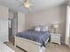 Comfortable bedroom featuring a blue comforter, white furnishings and natural light from the window at 104 Hyacinth St, Summerville, SC 29483