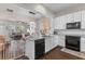 Modern kitchen featuring white cabinets, granite countertops, stainless steel appliances and an island at 104 Hyacinth St, Summerville, SC 29483