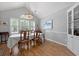 Bright dining room with wood floors and chandelier at 1048 Wayfarer Ln, Charleston, SC 29412