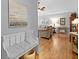 Welcoming entryway with bench seating leading into a cozy living area with hardwood floors at 1048 Wayfarer Ln, Charleston, SC 29412