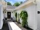 Inviting entryway featuring a black front door with a wreath and decorative greenery at 1048 Wayfarer Ln, Charleston, SC 29412