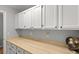 Functional laundry room with ample cabinet space and a neutral countertop at 1048 Wayfarer Ln, Charleston, SC 29412