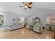 Open living space featuring comfortable seating and hardwood floors with vaulted ceilings at 1048 Wayfarer Ln, Charleston, SC 29412