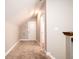 Finished attic space featuring neutral carpet and walls, recessed lighting, and access door at 1061 Ashley Gardens Blvd, Charleston, SC 29414