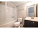 Clean bathroom featuring a shower-tub combo, toilet, and vanity with modern finishes at 1061 Ashley Gardens Blvd, Charleston, SC 29414
