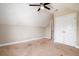 Upstairs bedroom with carpeted floors, ceiling fan, and closet at 1061 Ashley Gardens Blvd, Charleston, SC 29414