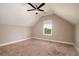 Upstairs bedroom with carpeted floors, and a bright window with natural light at 1061 Ashley Gardens Blvd, Charleston, SC 29414