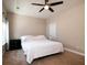 Inviting bedroom featuring a ceiling fan, neutral decor, and a comfortable queen-sized bed at 1061 Ashley Gardens Blvd, Charleston, SC 29414