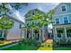 Attractive two-story home with lush landscaping and inviting front porch in a friendly neighborhood at 1061 Ashley Gardens Blvd, Charleston, SC 29414