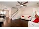 Bright living room showcasing hardwood floors, stylish furnishings, and easy access to kitchen at 1061 Ashley Gardens Blvd, Charleston, SC 29414