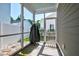 Cozy screened-in porch with access to a backyard at 1061 Ashley Gardens Blvd, Charleston, SC 29414