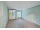 Bright bedroom with mirrored closet doors and large windows allowing ample natural light at 1115 Shadow Lake Cir, Mount Pleasant, SC 29464