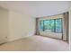 Bright and spacious bedroom with a large window offering views of lush greenery at 1115 Shadow Lake Cir, Mount Pleasant, SC 29464