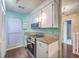 Well-lit kitchen with granite countertops, stainless steel range, and updated cabinetry at 1115 Shadow Lake Cir, Mount Pleasant, SC 29464