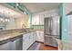 Bright kitchen features stainless steel appliances, granite countertops, and ample cabinet space at 1115 Shadow Lake Cir, Mount Pleasant, SC 29464