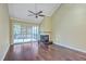 Bright living room featuring hardwood floors, vaulted ceiling, and a cozy fireplace at 1115 Shadow Lake Cir, Mount Pleasant, SC 29464