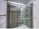 Sleek glass shower with modern tiling and convenient grab bars for accessibility at 1115 Shadow Lake Cir, Mount Pleasant, SC 29464