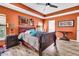 Well-furnished bedroom with a queen bed, side tables, a dresser, and natural light providing a cozy atmosphere at 113 Southernwood Dr, Ladson, SC 29456