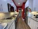 Modern kitchen featuring granite countertops, stainless steel appliances, and white cabinetry at 116 W 5Th South St # D, Summerville, SC 29483