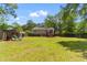 Backyard featuring a playset, lawn, deck, and fenced perimeter at 117 Canaberry Cir, Summerville, SC 29483