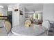 Charming dining area with white cabinets and a round table with lemons at 117 Canaberry Cir, Summerville, SC 29483