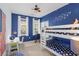 A bedroom decorated with patriotic themes, including star decals and a bunk bed at 1225 Blakeway St # 407, Charleston, SC 29492