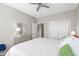 Bright bedroom with a large bed, ceiling fan, and large closet at 1225 Blakeway St # 407, Charleston, SC 29492