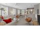Inviting living and dining area with contemporary decor, abundant natural light, and a seamless flow at 1225 Blakeway St # 407, Charleston, SC 29492