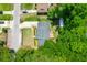 Aerial view of a well maintained home with green backyard, deck, shed and a driveway with ample parking at 1416 Glencoe Dr, Mount Pleasant, SC 29464