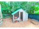 Backyard featuring a chicken coop with a green roof and mesh wire at 1416 Glencoe Dr, Mount Pleasant, SC 29464