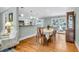 Cozy dining area leading to open kitchen with hardwood flooring at 1416 Glencoe Dr, Mount Pleasant, SC 29464