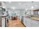 Bright kitchen with stainless steel appliances, a breakfast nook, and ample natural light from the bay window at 1416 Glencoe Dr, Mount Pleasant, SC 29464