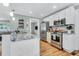 Modern kitchen featuring stainless steel appliances, white cabinetry, and granite countertops at 1416 Glencoe Dr, Mount Pleasant, SC 29464