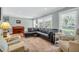Stylish living room with large windows and comfortable seating at 1416 Glencoe Dr, Mount Pleasant, SC 29464