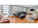 Stylish living room with large windows and hardwood flooring at 1416 Glencoe Dr, Mount Pleasant, SC 29464